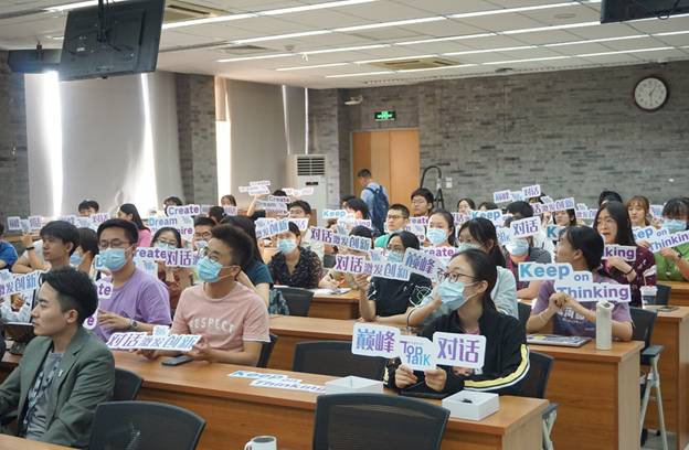 A group of people sitting in a roomDescription automatically generated with low confidence A group of people sitting in a roomDescription automatically generated with low confidence